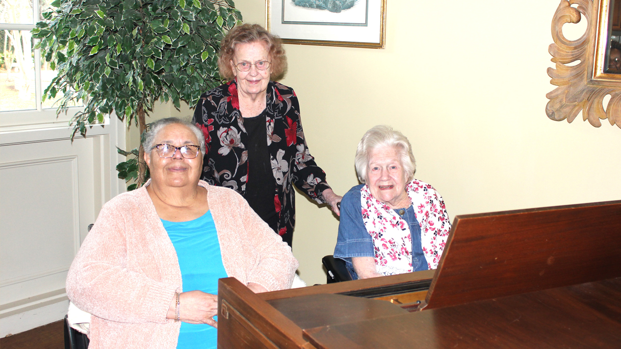 elderly women at piano